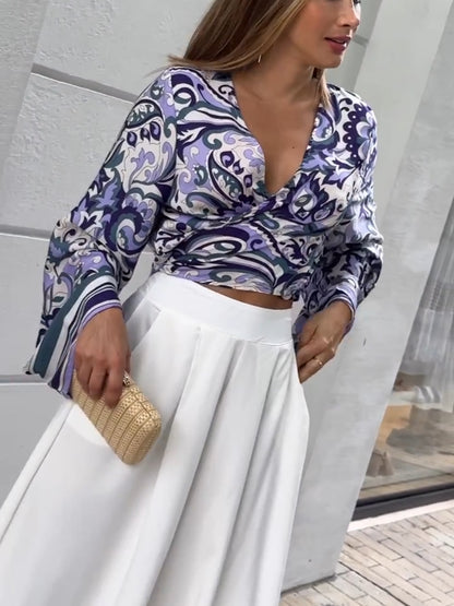 Purple printed top and white loose pants suits