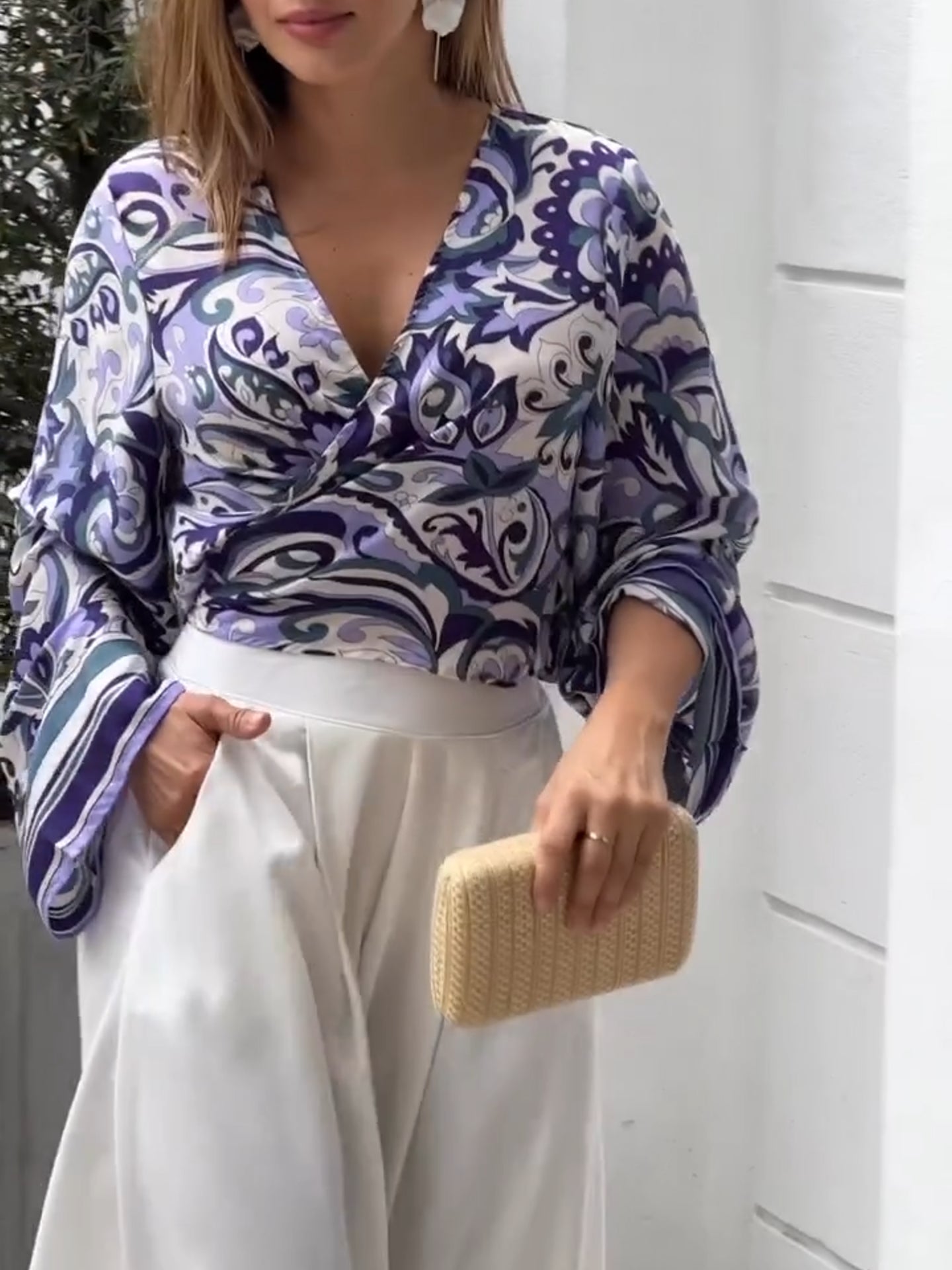 Purple printed top and white loose pants suits